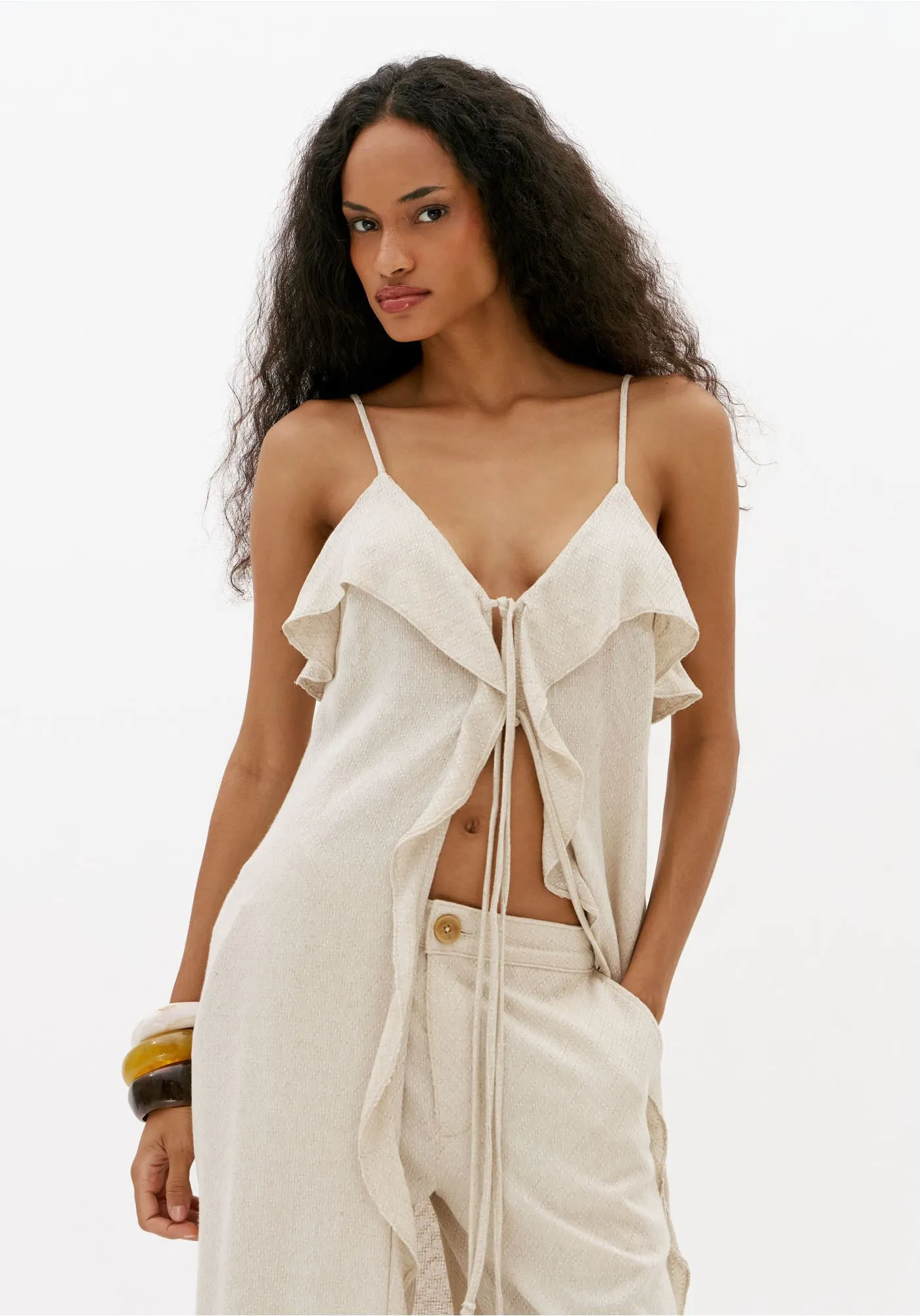 BLUSA ALONGADA DE ALCA COM LINHO